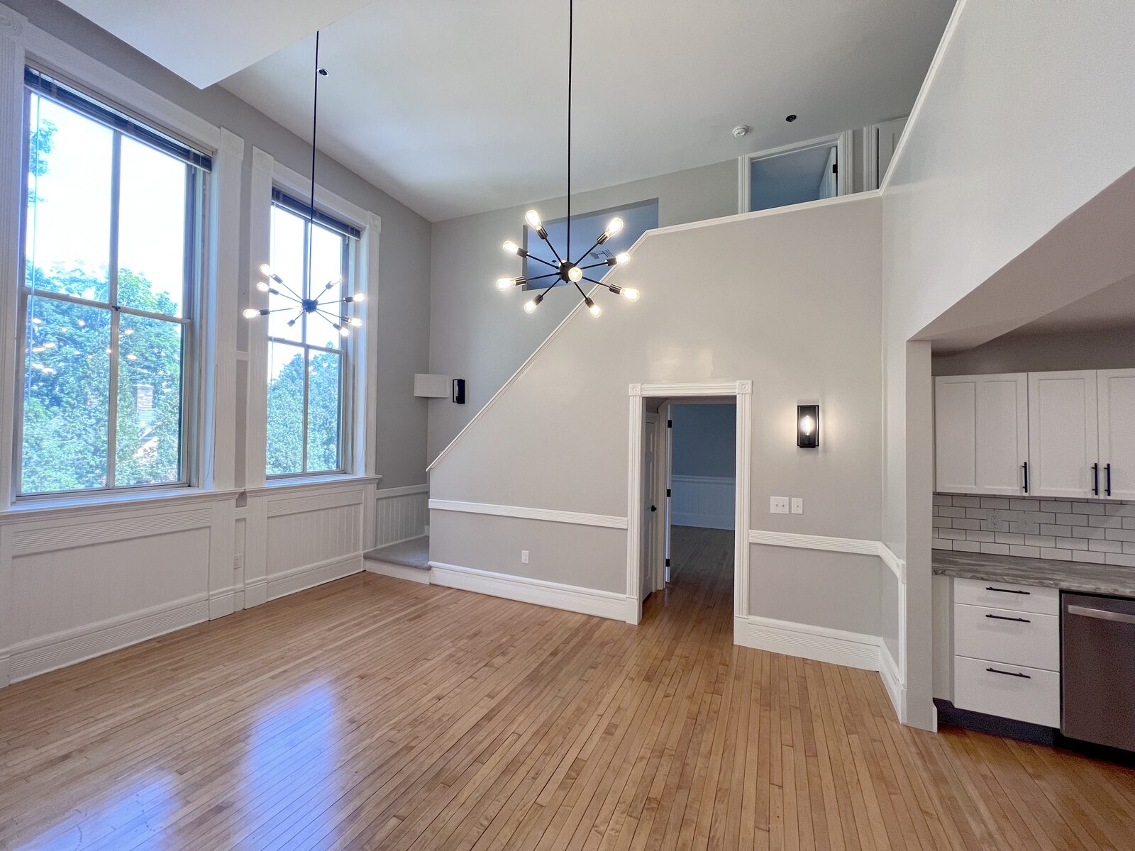 Three-bedroom residence with dramatic 18-foot great room and open loft above